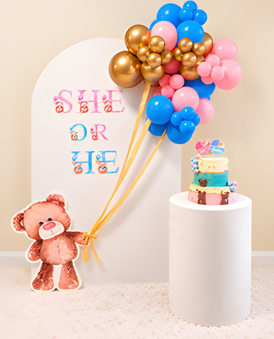 She or He gender reveal balloon styling with a teddy bear